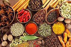 many different types of spices on a table