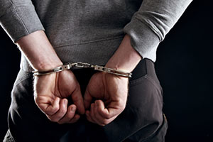 a person in handcuffs 